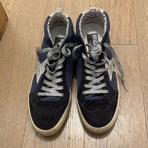 Golden goose sneakers essentially new condition just don’t fit.